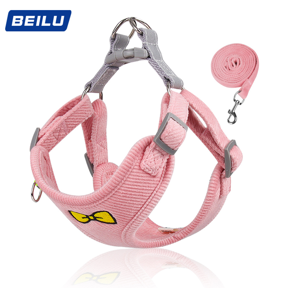 Pink corduroy bow dog harness shown with matching leash