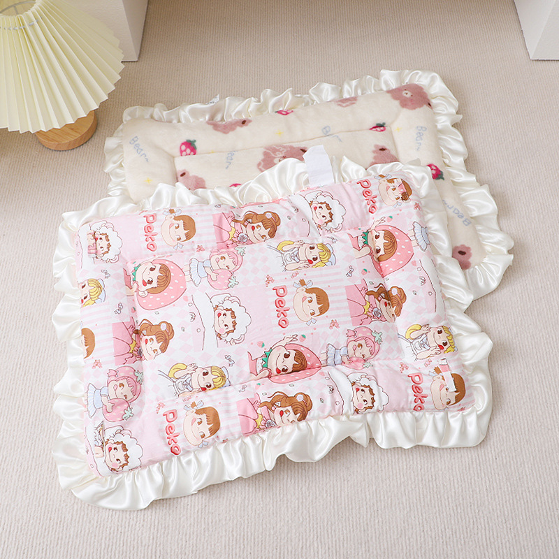 Pink Peko cozy plush pet sleeping mat on a soft floor
