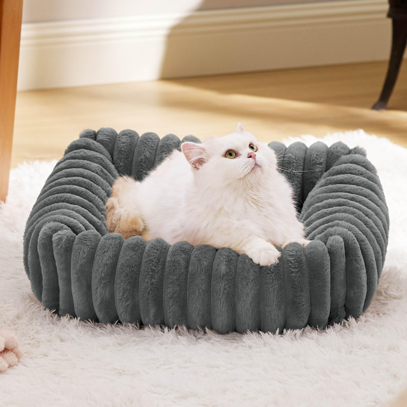 Gray plush sofa dog bed with raised cushioned sides