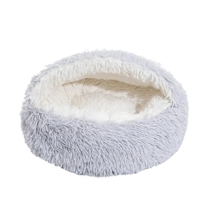 Semi-enclosed shell dog bed on a white background